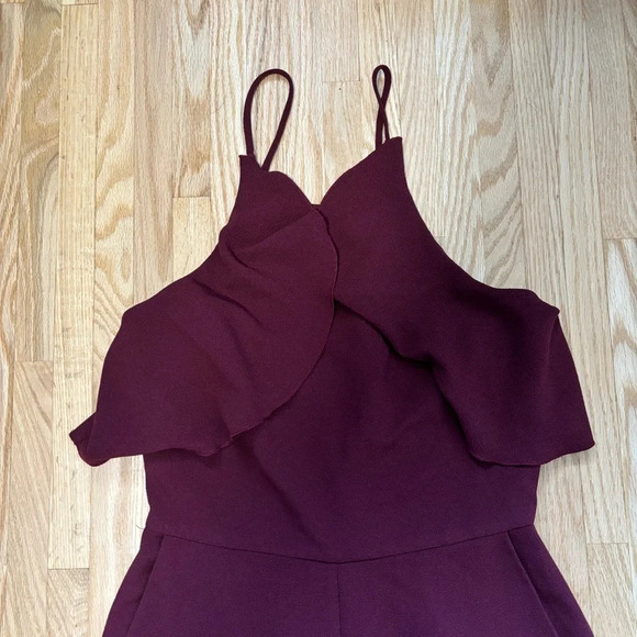 Charles Henry | Burgundy Wide Leg Ruffle Tie Up Halter Jumpsuit with Zipper Back - Picture 4 of 9